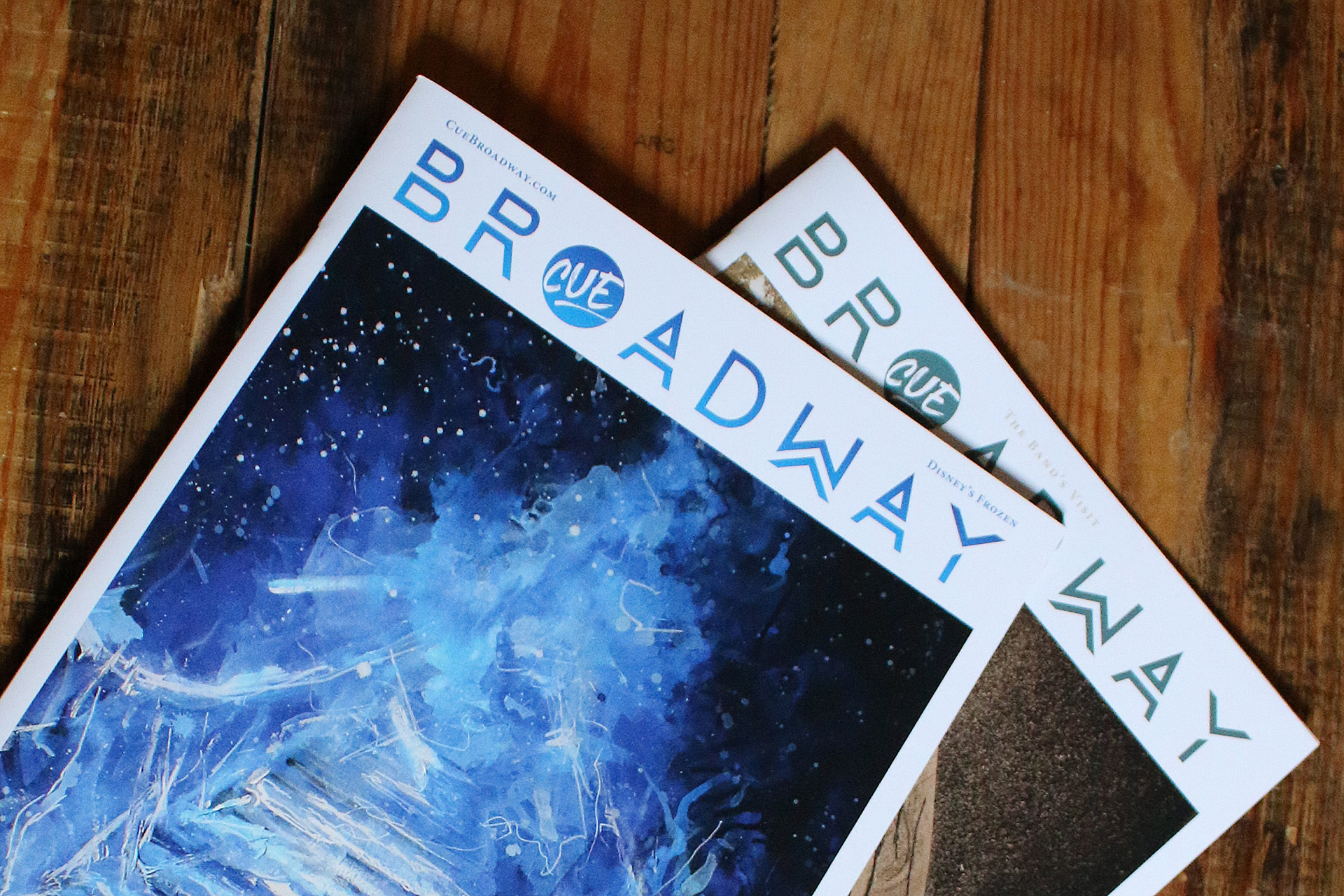 Two Cue Broadway Magazines with Frozen Issue on Top
