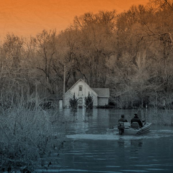 Rebuild the Heartland Graphic with Two Men in a Flooded River by a House
